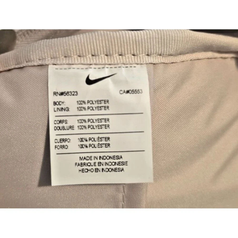 Clean Nike Backpack. Soft neutral style. Ready for every day.